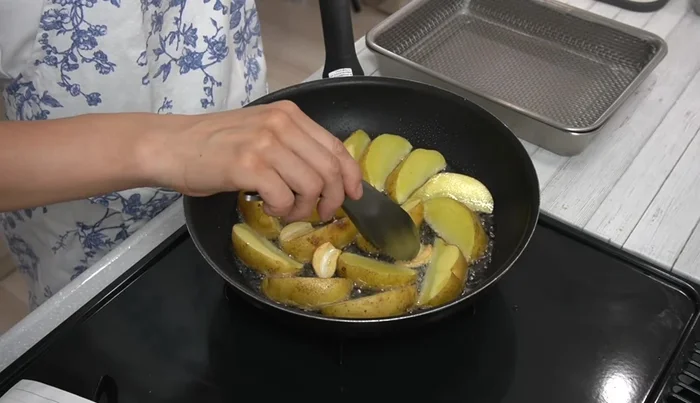 Remove the garlic after it has softened (around 34 minutes).