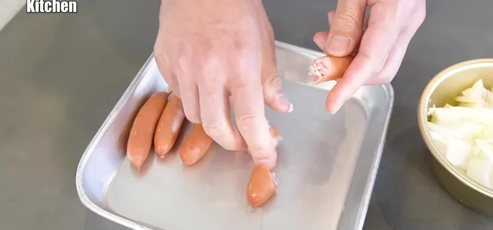 Prepare sausages: Tear the sausages instead of slicing them thinly. This helps distribute flavor better.
