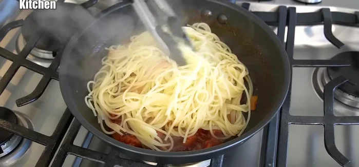 Combine pasta and sauce: Add the cooked pasta to the sauce. Add butter and mix well to create a richer flavor.