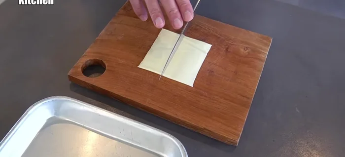 Cut the cheese into 4 equal parts vertically (106.92).