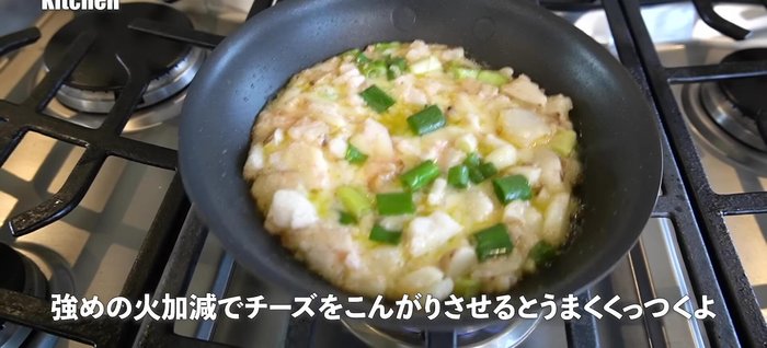 Fry until golden brown, then place a smaller lid or plate on top to help it cook evenly.