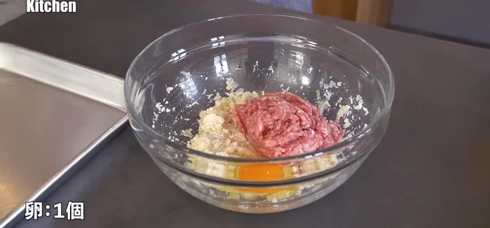 Add ground meat, eggs, and salt, mixing well with your hands until evenly combined.