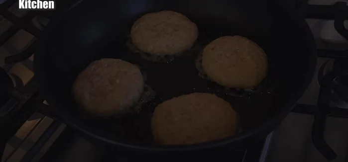 Cook the patties in a frying pan over medium heat, until golden brown on both sides. Use the pan's edge to help flip them.