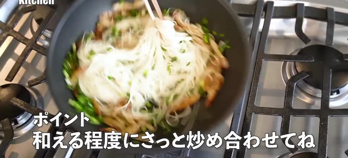 Add the seasoned somen to the pan and stir-fry quickly until everything is heated through. Season with salt or soy sauce to taste.