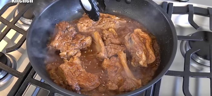 Increase heat to evaporate excess moisture and brown the ribs further. Pour the leftover sauce over the ribs to thicken and add more flavor.
