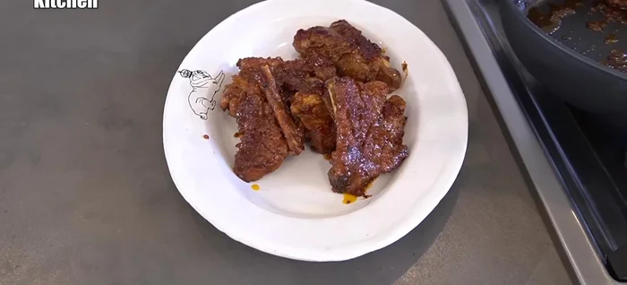 Plate and serve the BBQ spare ribs.