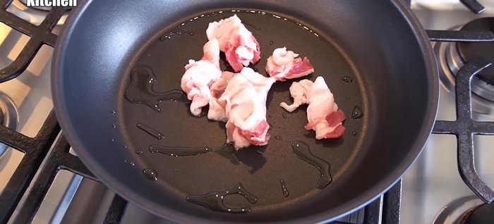 Heat sesame oil in a frying pan and stir-fry the pork until it releases its oil.