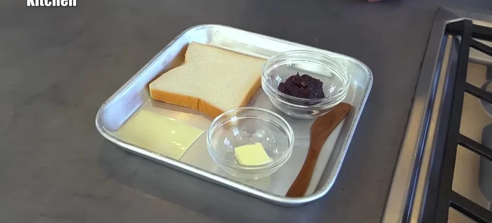 For the sweet sandwich: Repeat steps 1-3 with a new slice of bread. Add Ogura butter and cheese.