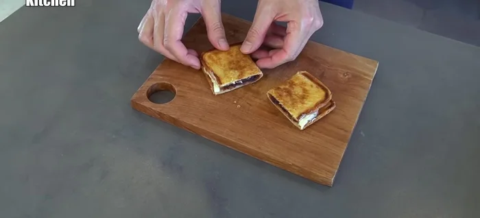 Cut the sweet sandwich.