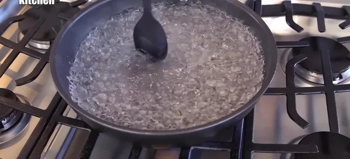Boil spaghetti in salted water in a frying pan for longer than the package instructions indicate. Fold the spaghetti in half while boiling for a smoother texture.