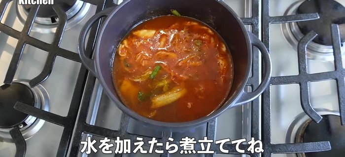 Add water (use less than usual, as the seafood mix and vegetables release moisture).