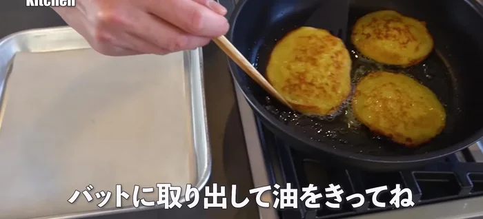 Remove pancakes from pan and drain excess oil.