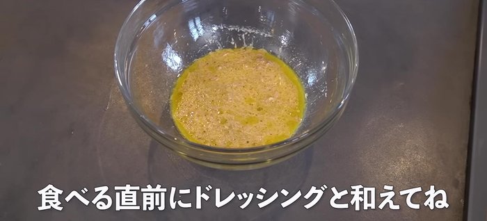 Just before serving, mix the dressing with the shredded cabbage.