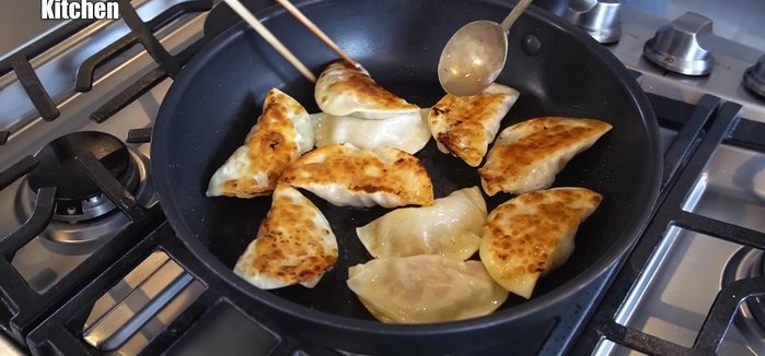 Grill the gyoza on both sides until golden brown and crispy.