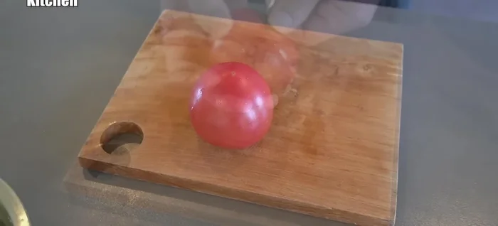 Prepare the tomatoes: Cut the tomatoes into bite-sized pieces.