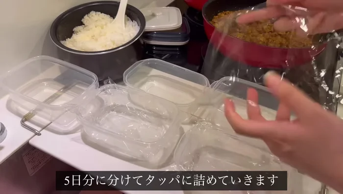 Divide the curry into 5 portions and pack into Tupperware containers.