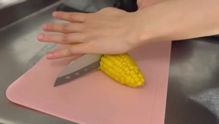 Remove the corn kernels.