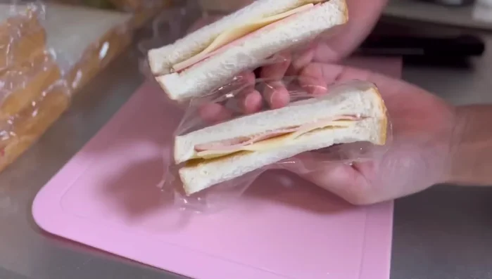 Cut sandwiches into desired shapes.