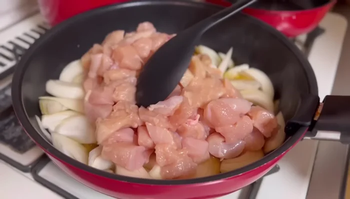Add onion and chicken, cover, and cook until done.