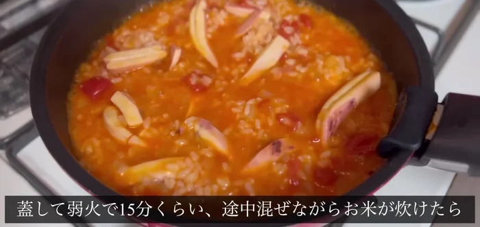 Once the rice is cooked, I'll add the bell peppers and clams.