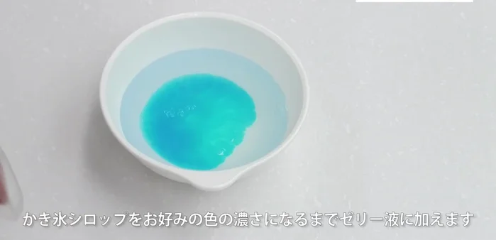 Layer the fruits and the cooked jelly in the molds according to your preference. This is the creative part; the transcript doesn't give specific instructions (e.g. order of layering)