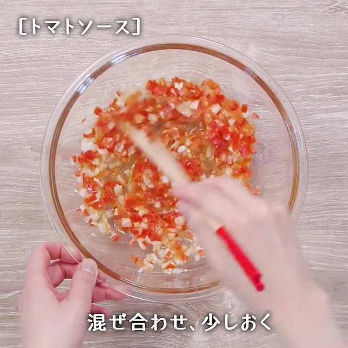 Serve the seared tuna over the prepared tomato sauce. (This step is implied, and details are missing from the transcript)