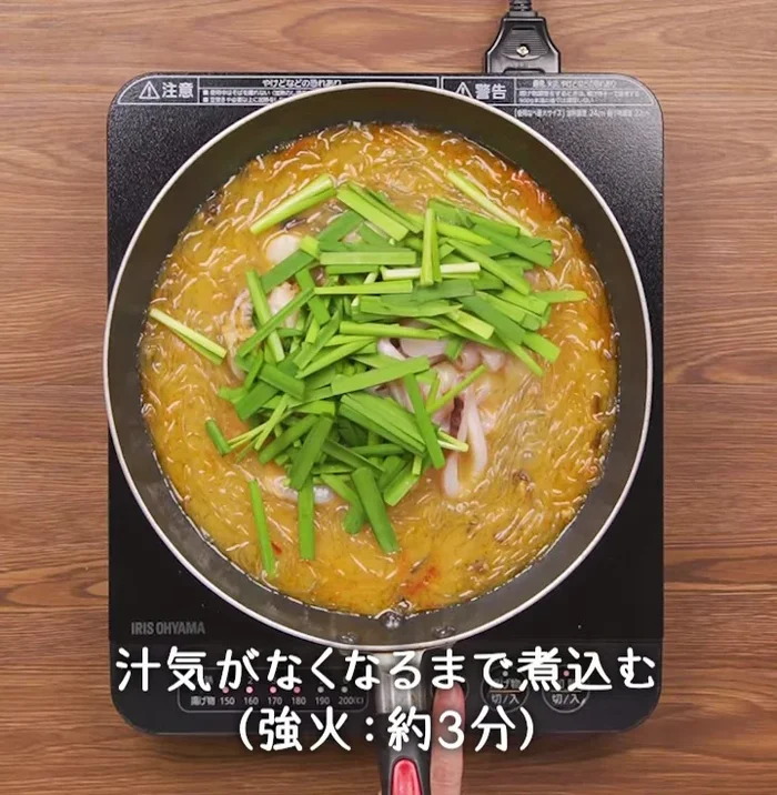 Add seafood, soy sauce, shaoxing rice wine, and sugar. Stir-fry until seafood is cooked through.