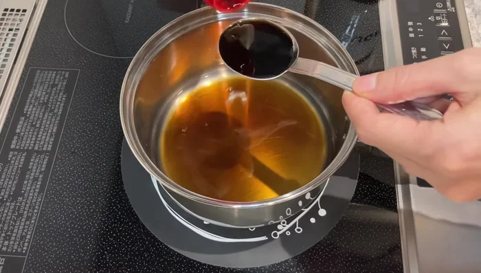 Cook the tofu and onion. (Specific cooking method and timing are not specified in the transcript).