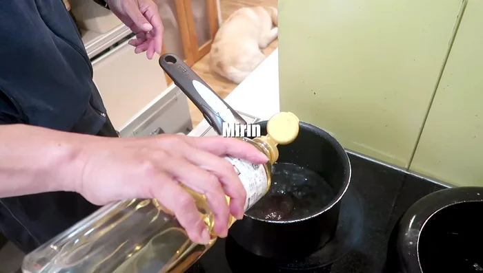 Boil sake and mirin until the alcohol evaporates. Add soy sauce, water, ginger, and sugar.