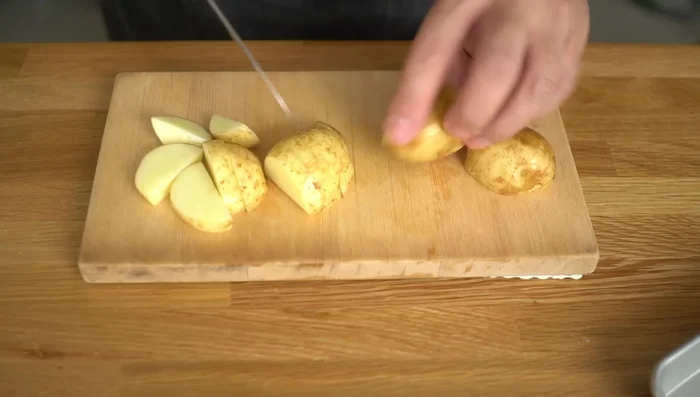 Cut potatoes into 1cm half-moon slices (or quarters then 1cm pieces for regular potatoes). Cut bacon into 2cm pieces.