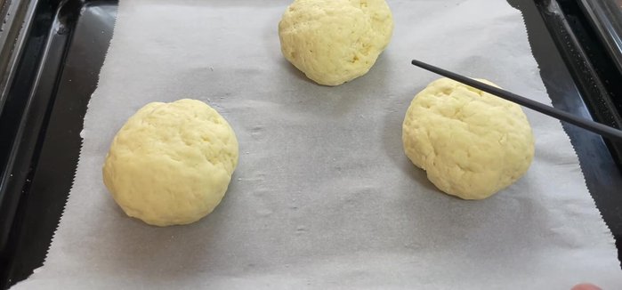 Create a pattern on the dough (e.g., a cross).