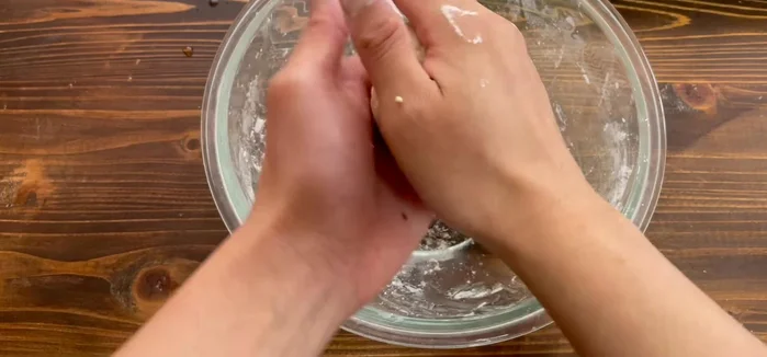 Roll the dough into a ball to give it shape. Make it slightly taller.