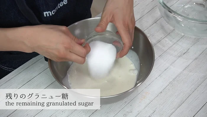 In a separate bowl, whip the fresh cream with the remaining granulated sugar and lemon juice until stiff peaks form over iced water.