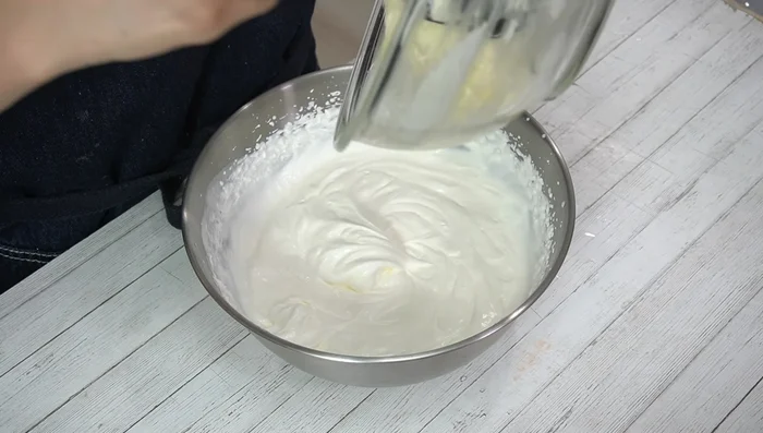 Gently fold the whipped cream into the cream cheese mixture until combined.