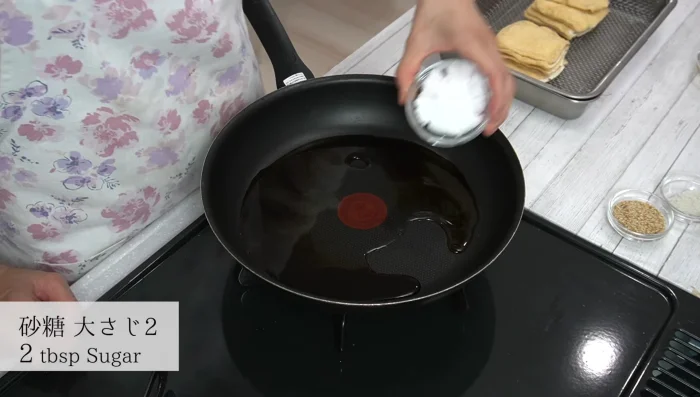 Prepare the seasoning: In a pan, combine soy sauce, mirin, sugar, dashi, and water. Bring to a boil.
