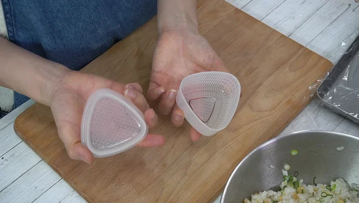 Shape the classic rice balls using an onigiri mold or your hands.