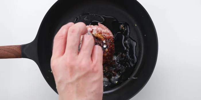 Add tamari soy sauce, vegetable oil, and baking soda. Cook over medium-high heat, breaking up the meat into small crumbs.