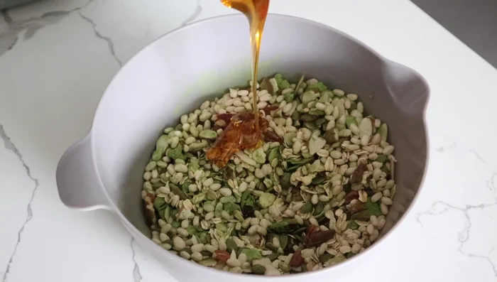 Add honey and/or maple syrup. Stir until everything is well coated.