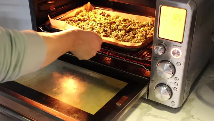 Bake for 10 minutes, then take out, stir, and bake for another 10-15 minutes until lightly browned.