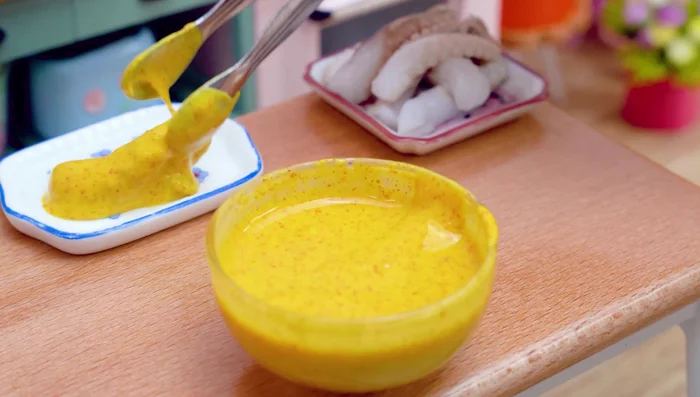 Dip the octopus into the batter mixture.