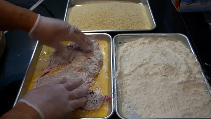Coat the steak in plain white flour, then egg, then panko breadcrumbs. Fry for 3 minutes per side.