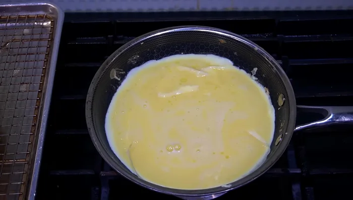 Make a runny scrambled egg (about 20 seconds).