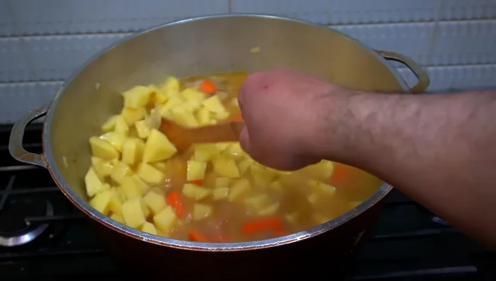 Add chopped yukon potatoes, stir, and let it boil for about 30 minutes. Adjust seasoning to taste.