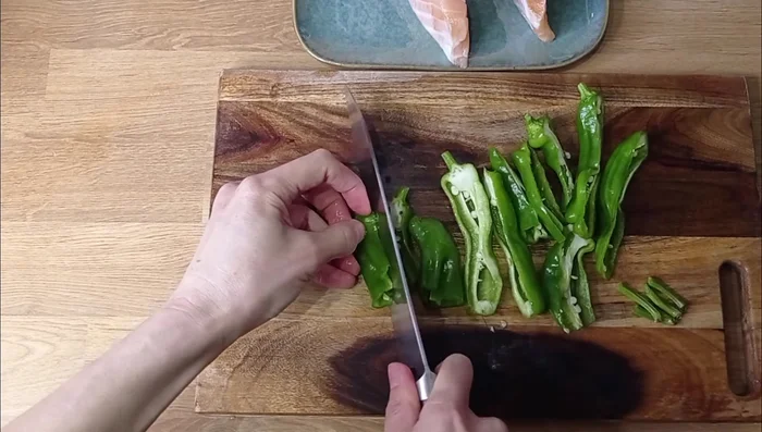 Wash and cut frigitelli peppers in half or quarters.