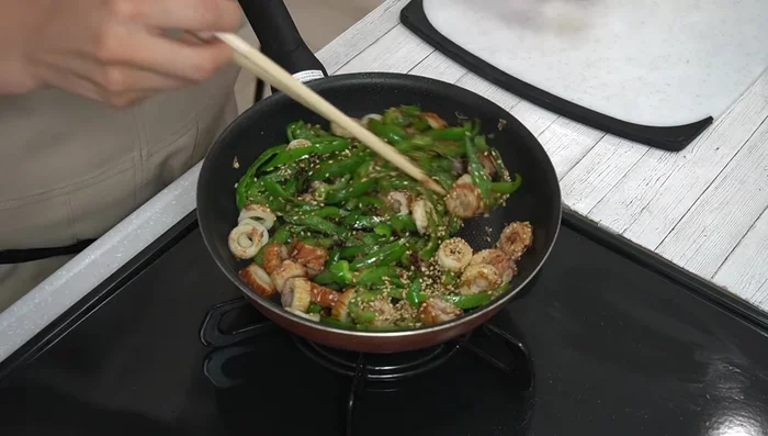 Add soy sauce and stir-fry briefly.