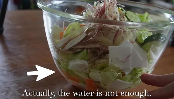 Add all prepared vegetables to one of the saltwater bowls. Ensure they are fully submerged; use pressure to submerge if needed. Let it sit for 15 minutes at room temperature.