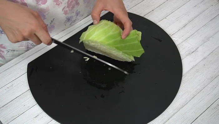 Prepare the cabbage: Wash and thoroughly dry the cabbage. Remove the core and chop finely. Place in a plastic bag with salt, shake to coat, and let sit for 5-10 minutes to release moisture.