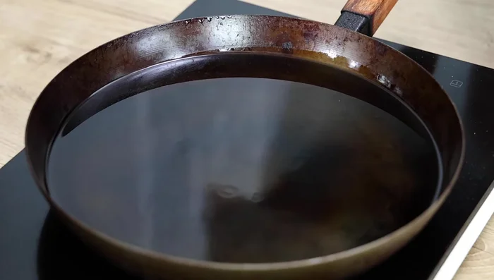Deep fry the tofu in vegetable oil at 170° until golden brown on both sides.