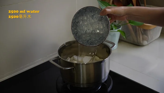 Place the radish in a pot and add water. Bring to a boil, then reduce heat and simmer for 30 minutes, or until soft and slightly translucent.