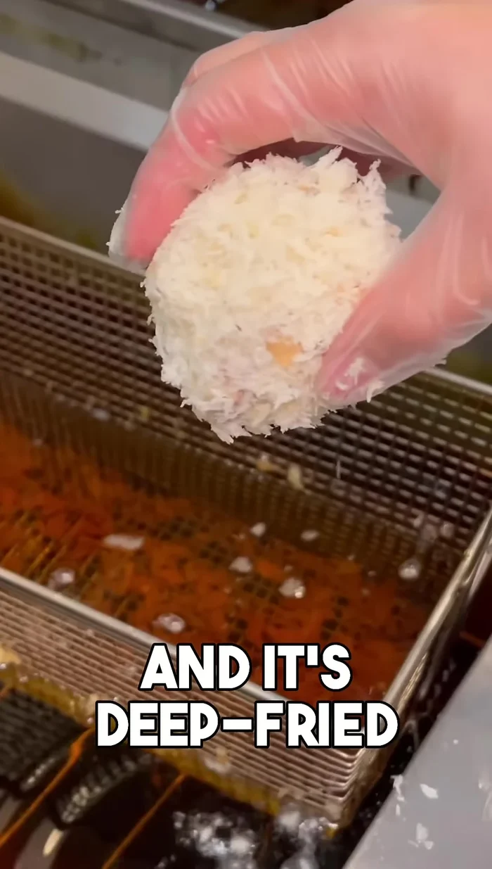 Prepare the Ebie (tiger shrimp). Wrap the shrimp and deep fry.